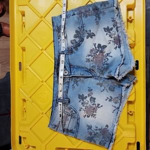 Rose print cut off denim shorts